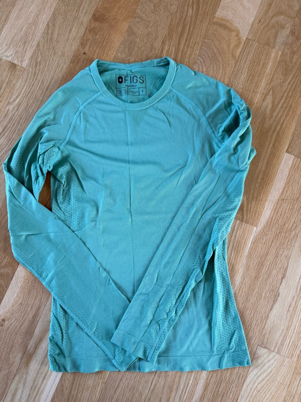 FIGS Women’s Long Sleeve Top in Green